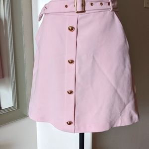 Pink belted skirt with gold buttons